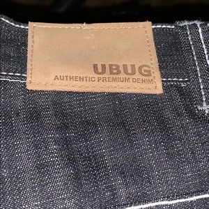 Black dark wash rinse jeans with white seams